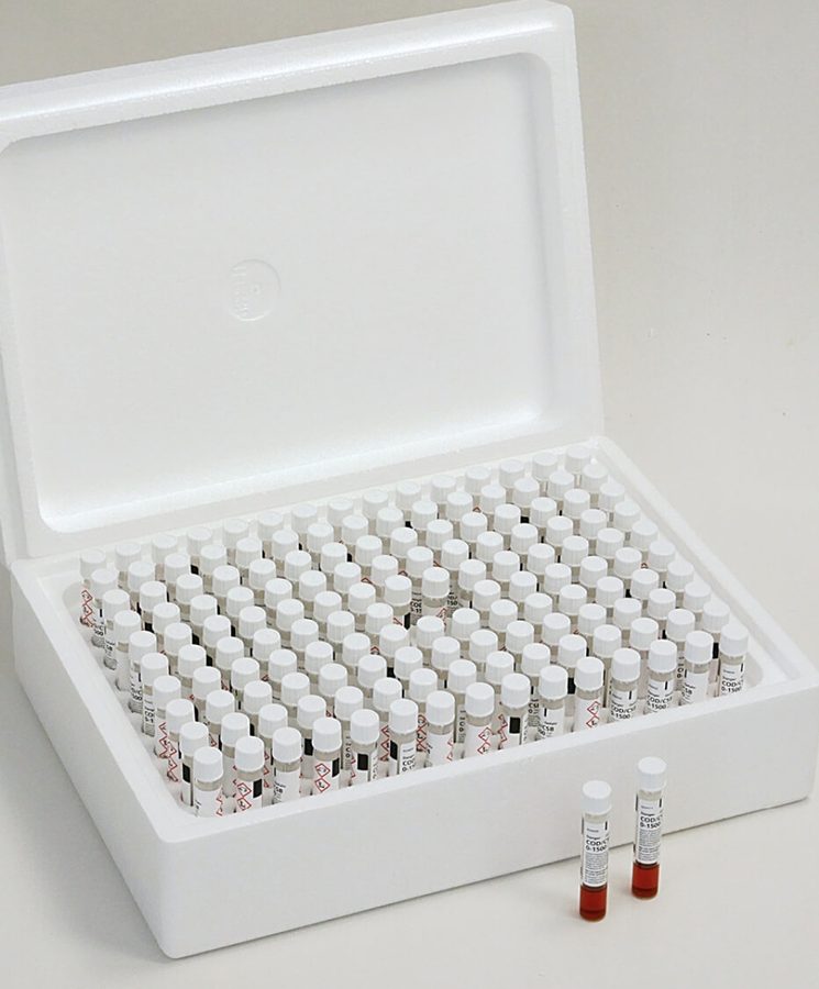 Opened Lovibond COD Vario tube test box holding 150 reagent tubes, with two prepared tubes in front